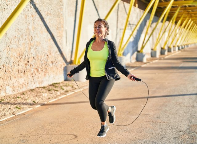 middle aged woman jumping rope for exercise to improve endurance